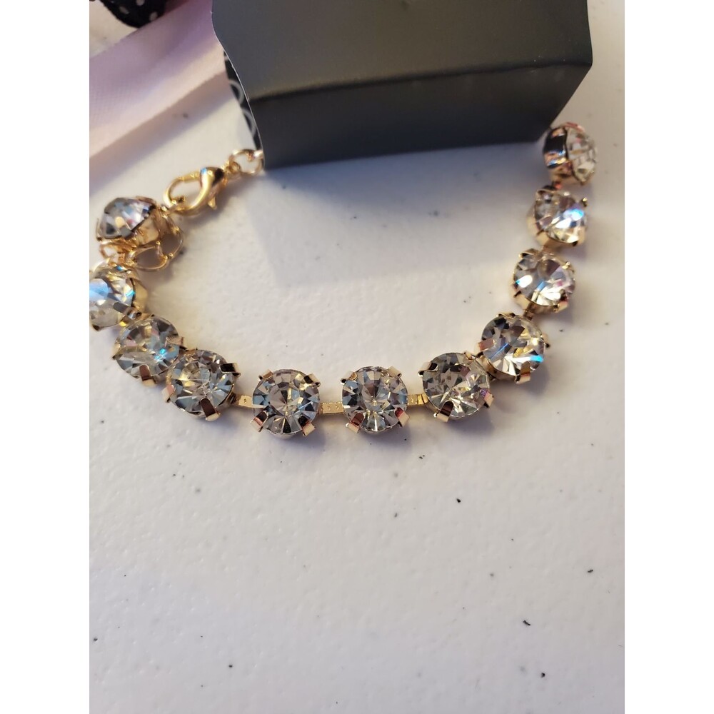 Gold rhinestone bracelet.